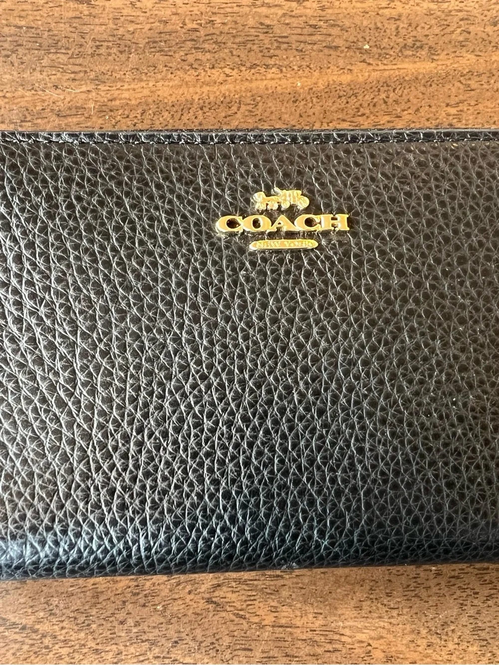 Coach Black Pebbled Leather Zip Around Wallet with Gold Coach Logo